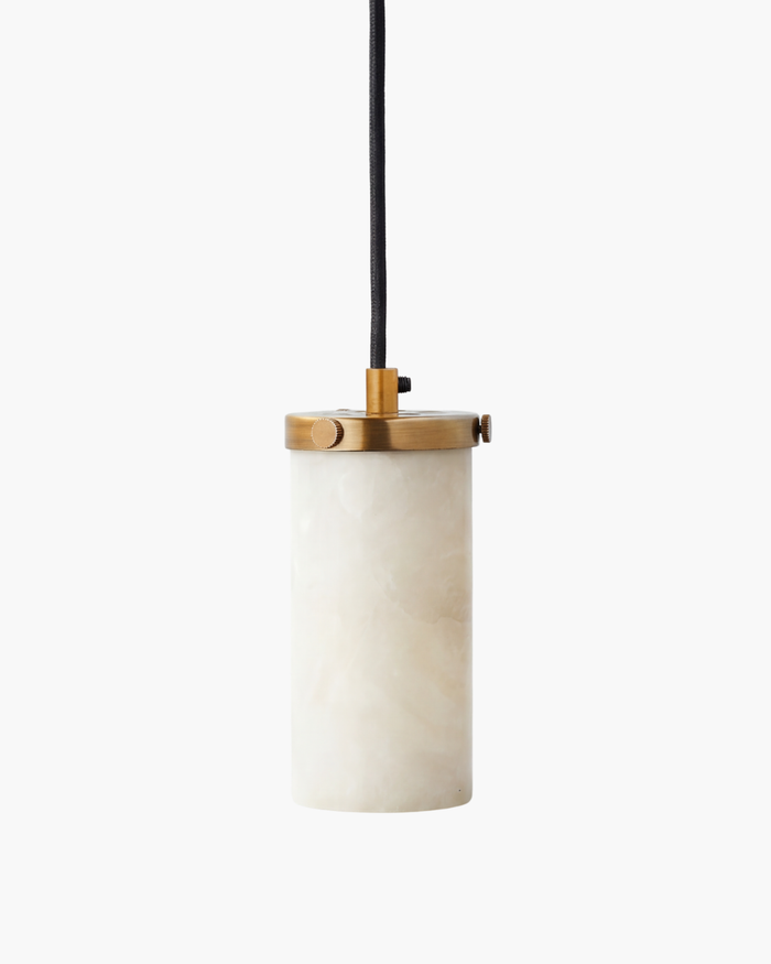 Pendant light with white glass shade and gold metal fixture on a white background